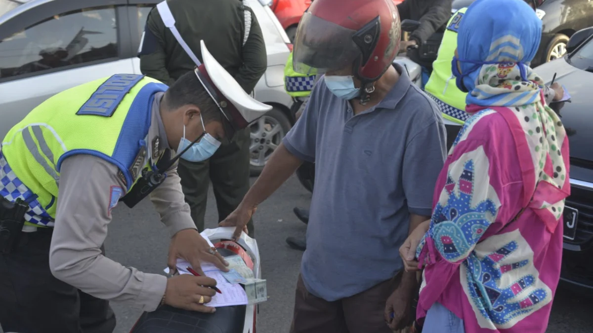 tilang manual kembali diterapkan