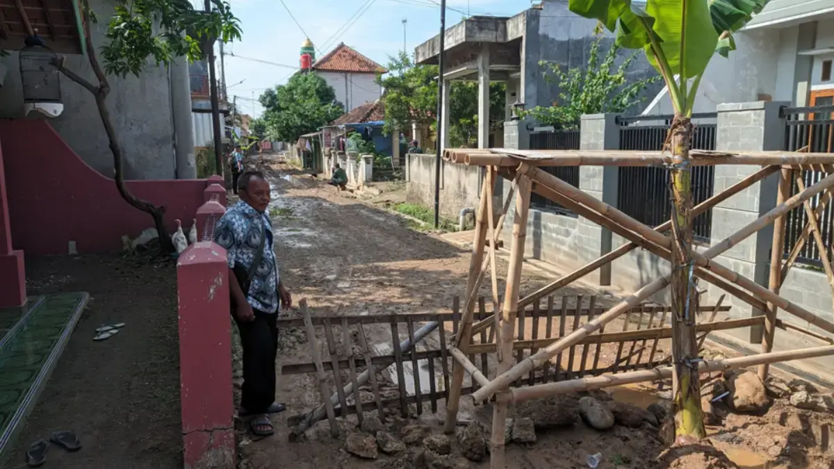 Memblokade ruas jalan
